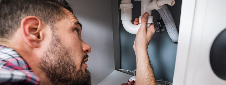 Canberra plumber fixing the sink pipe
